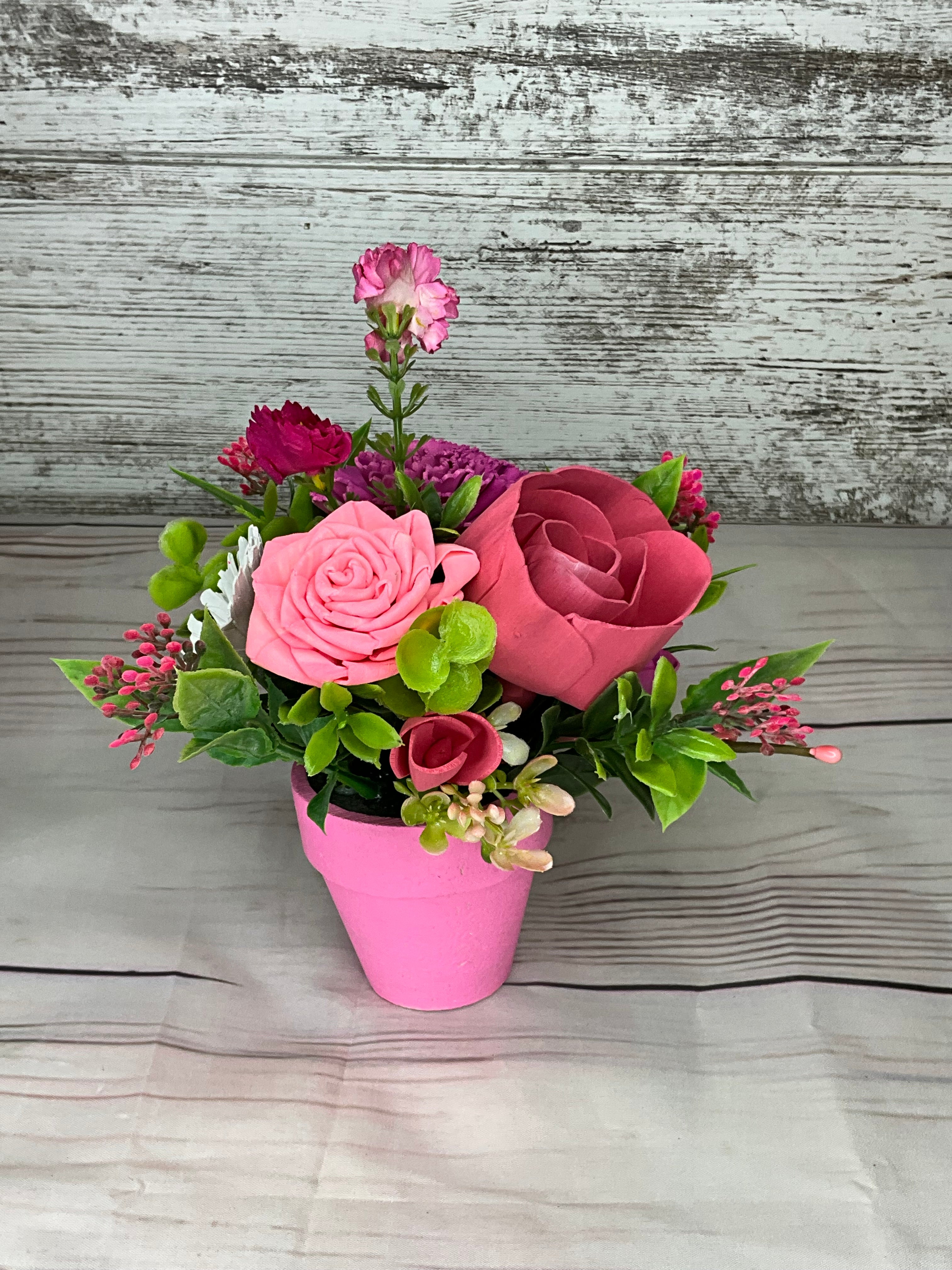 Pretty in Pink - Mixed Pink Sola Wood Flower Arrangement Description: This charming han